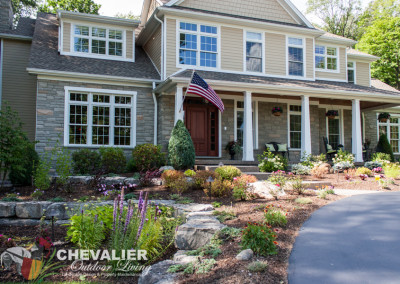 unique fancy WNY western New York Chevalier outdoor living landscape build built color seasons smells scents annual flower plants texture layer beautiful pretty green leaves petals summer spring fall house home